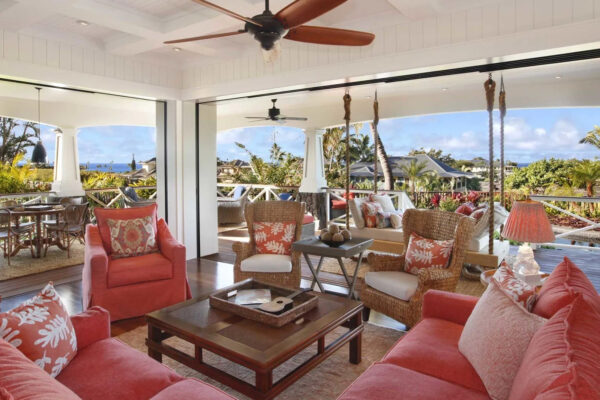 A living room with couches and chairs in it